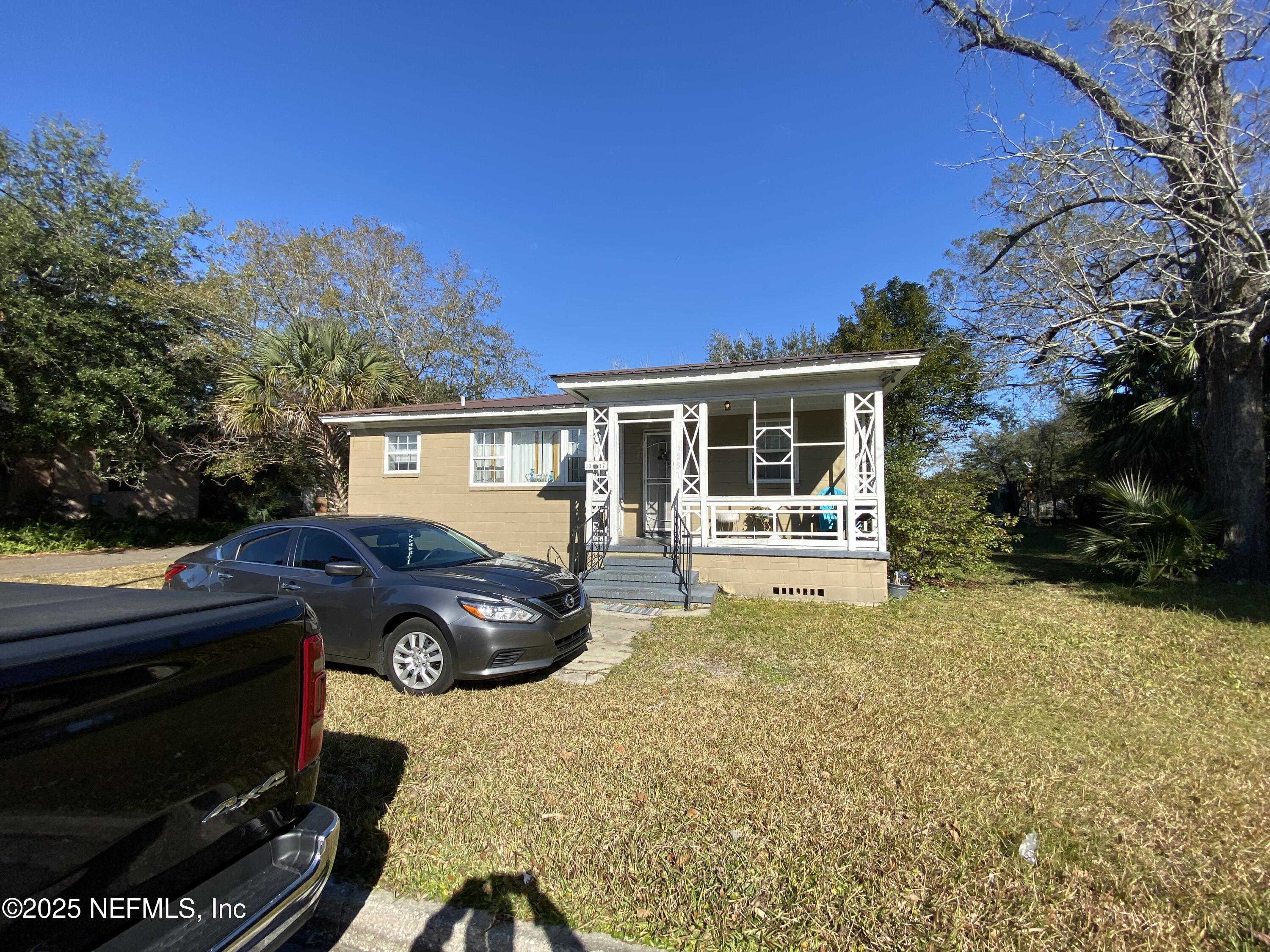 10321 Westmar Road Jacksonville, FL 32218 - Photo 4 of 7 a house view with a outdoor space