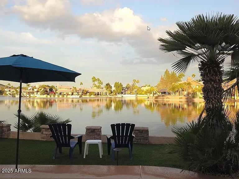 16625 South 34th Way Phoenix, AZ 85048 - Photo 28 of 36 a view of a lake with a table and chairs