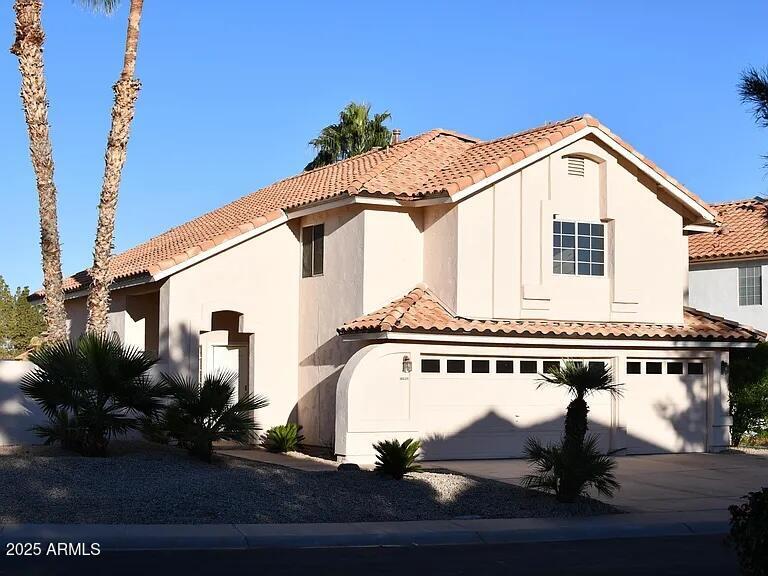 16625 South 34th Way Phoenix, AZ 85048 - Photo 35 of 36 a view of a house with a balcony and garden