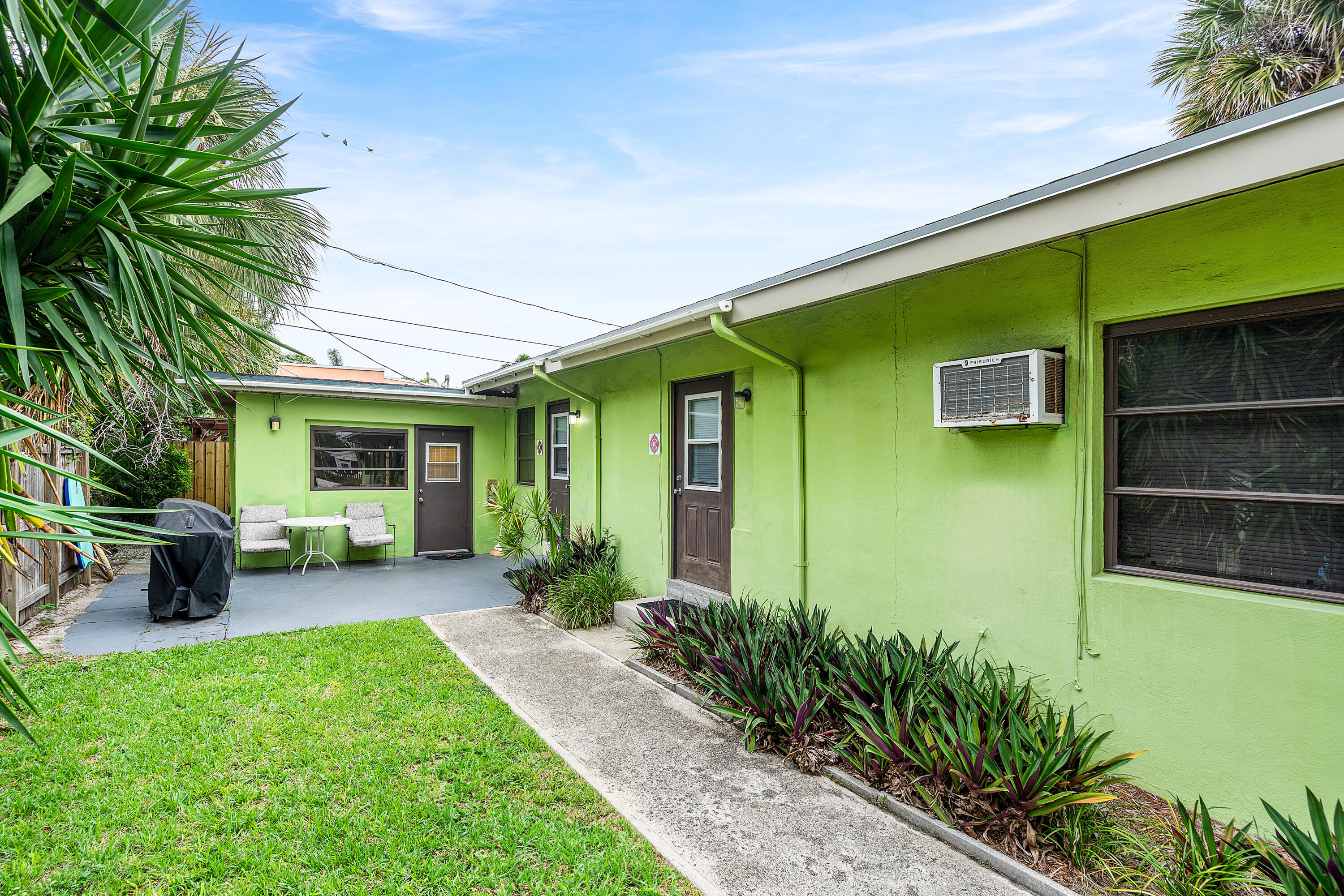 3308 Southeast 3rd Street Pompano Beach, FL 33062 - Photo 7 of 24 a front view of a house with garden and porch