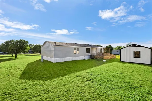 a house view with a garden space