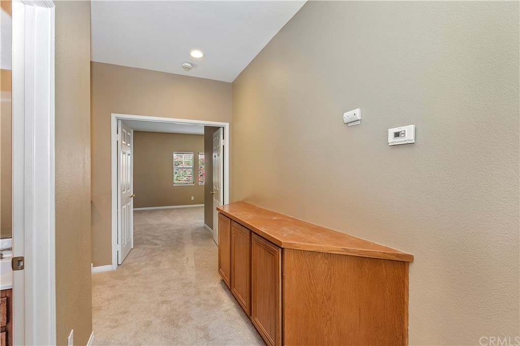 12358 High Horse Drive Rancho Cucamonga, CA 91739 - Photo 21 of 25 Ample storage for those extra rolls of toilet paper.