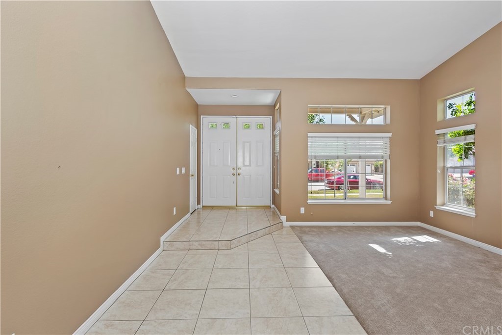 12358 High Horse Drive Rancho Cucamonga, CA 91739 - Photo 3 of 25 Gracious foyer leads to homey Living room with high ceilings.