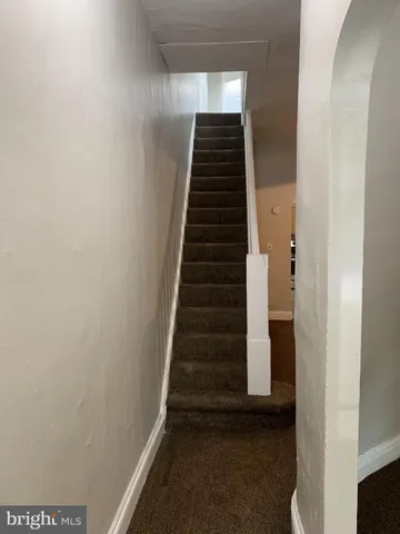 a view of hallway with stairs