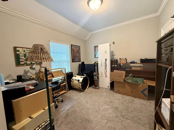 a bedroom with furniture and a couch