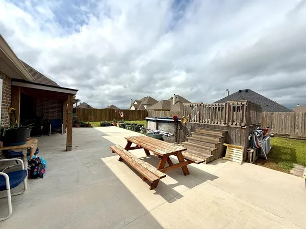 a view of a terrace with chairs