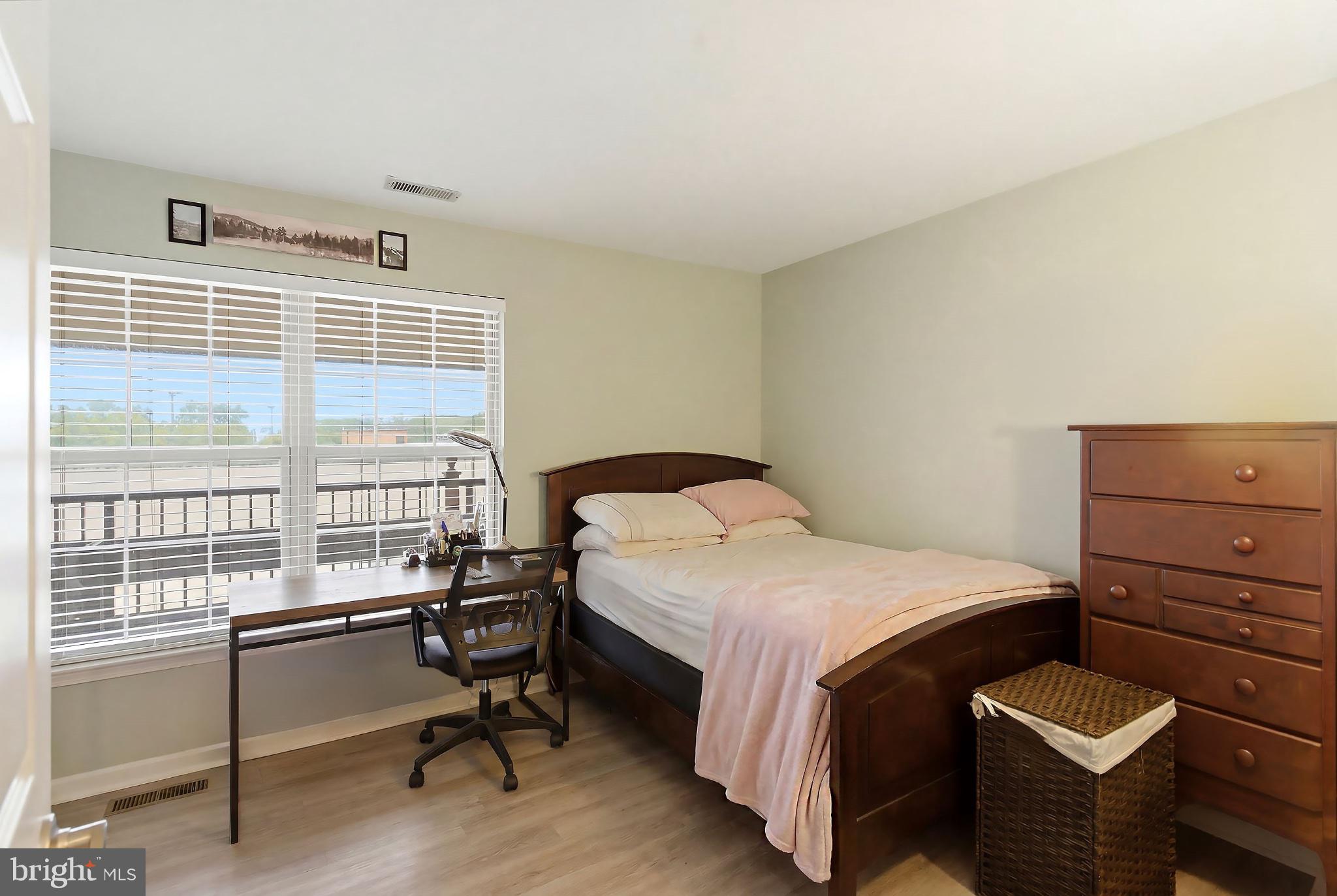 3036 Main Street, Unit 3036 Voorhees, NJ 08043 - Photo 14 of 24 Bright and inviting bedroom retreat.