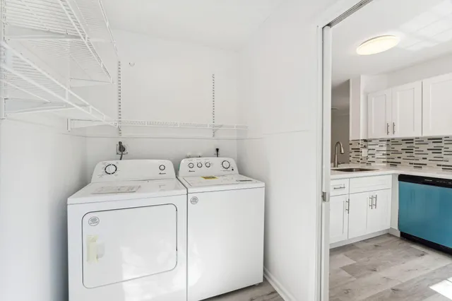 a utility room with dryer and washer