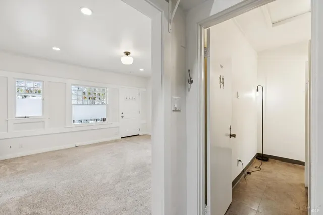 an empty room with windows