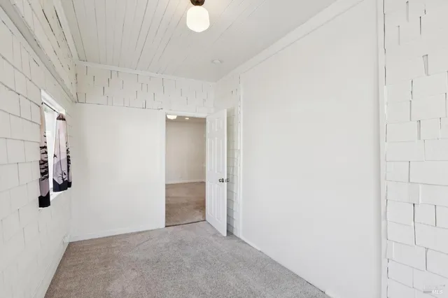 a view of a utility room with window
