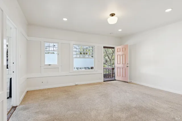 an empty room with windows