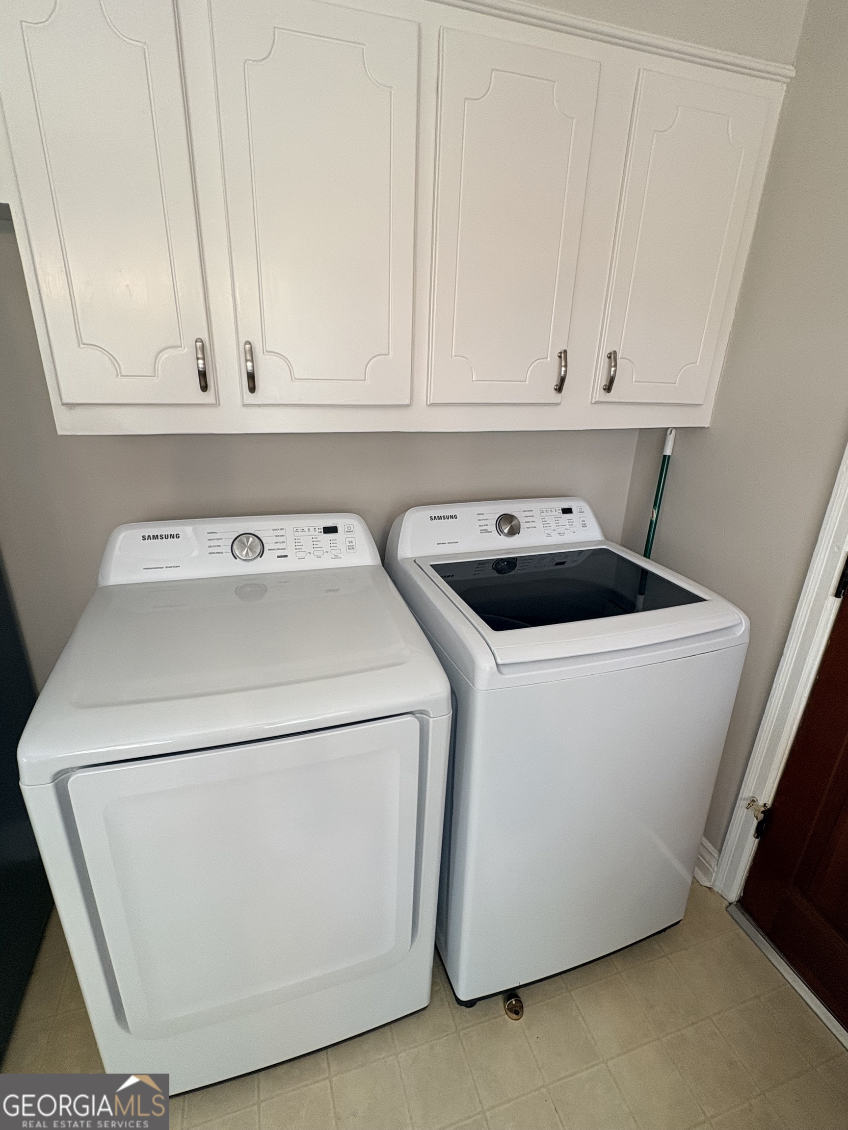 218 Flora Avenue Southeast Rome, GA 30161 - Photo 21 of 24 a utility room with dryer and washer