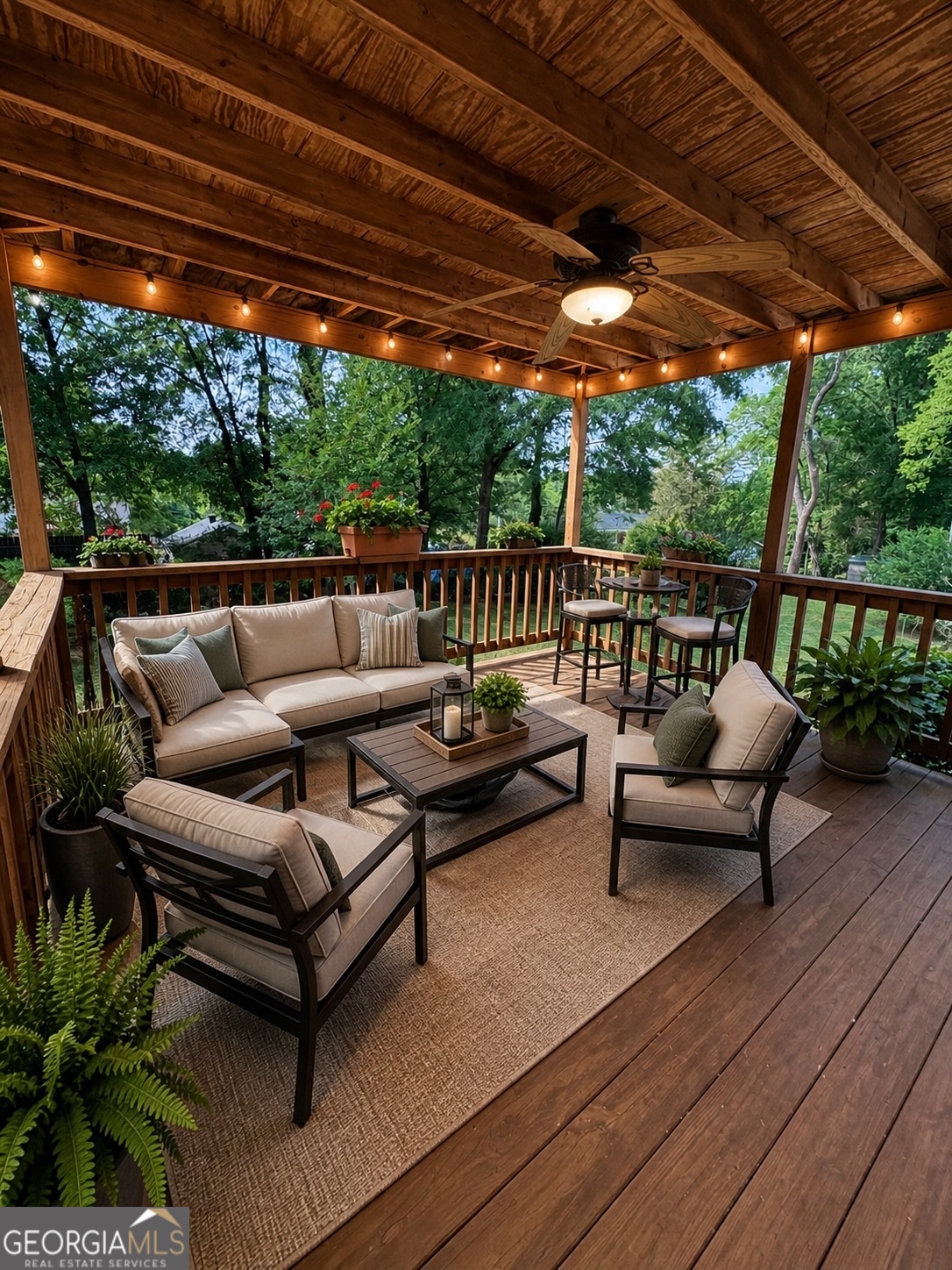 218 Flora Avenue Southeast Rome, GA 30161 - Photo 6 of 24 a roof deck with a table and chairs with wooden floor