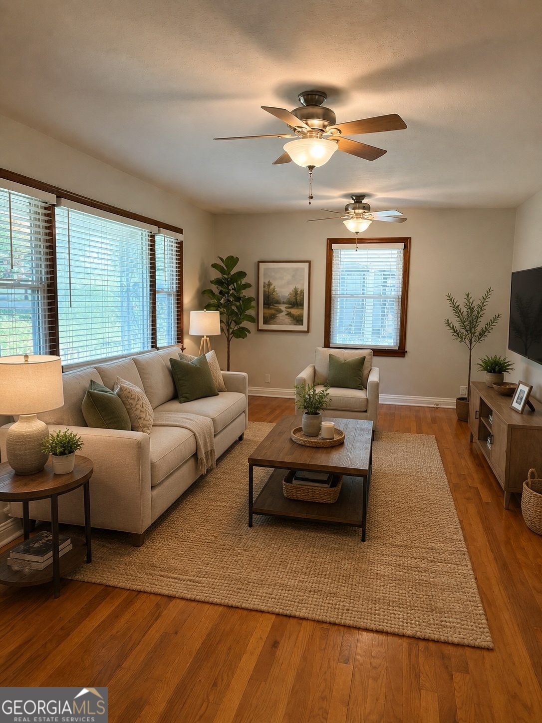 218 Flora Avenue Southeast Rome, GA 30161 - Photo 10 of 24 a living room with furniture and a flat screen tv