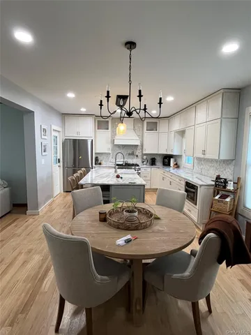 a view of a dining room with furniture