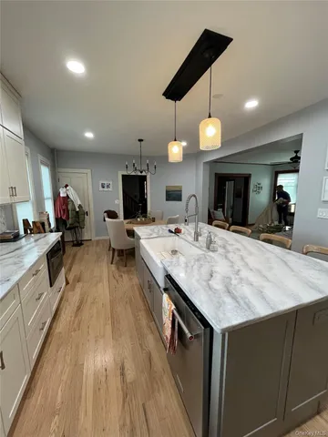 a view of house with backyard