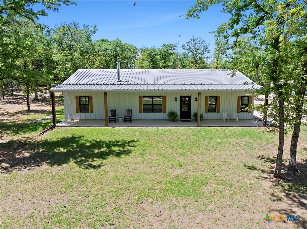 2324 Myrtle Lane Cameron, TX 76520 - Photo 1 of 1 a front view of a house with garden