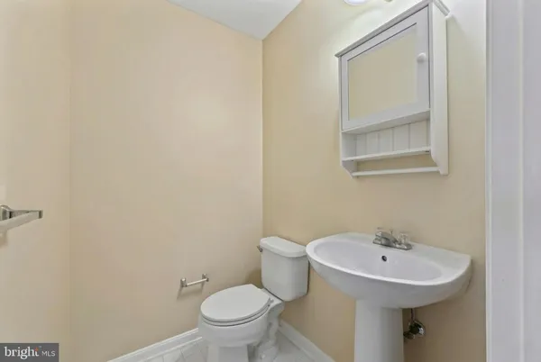 a bathroom with a sink and a toilet