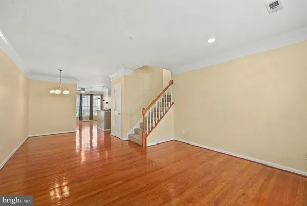 a view of entryway with wooden floor