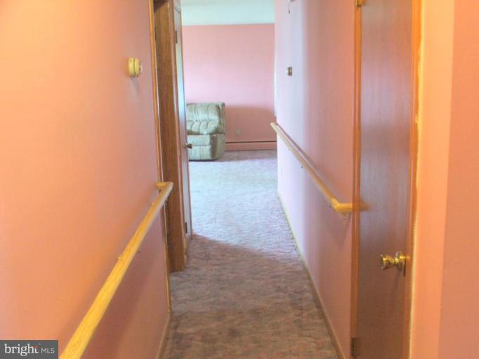1101 Oakland Terrace Road Halethorpe, MD 21227 - Photo 10 of 21 View Down Main Level Hallway to LR