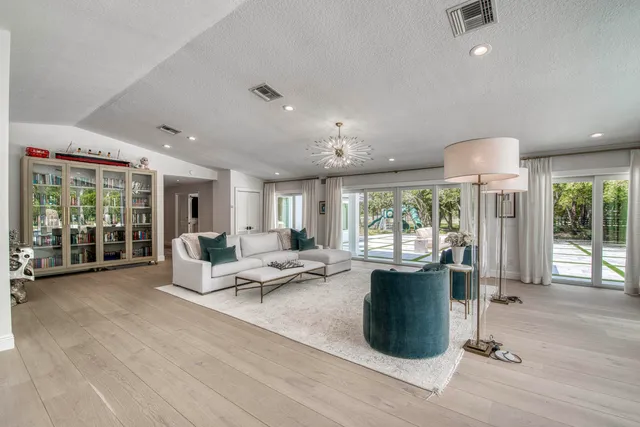 a view of a playground with a swimming pool