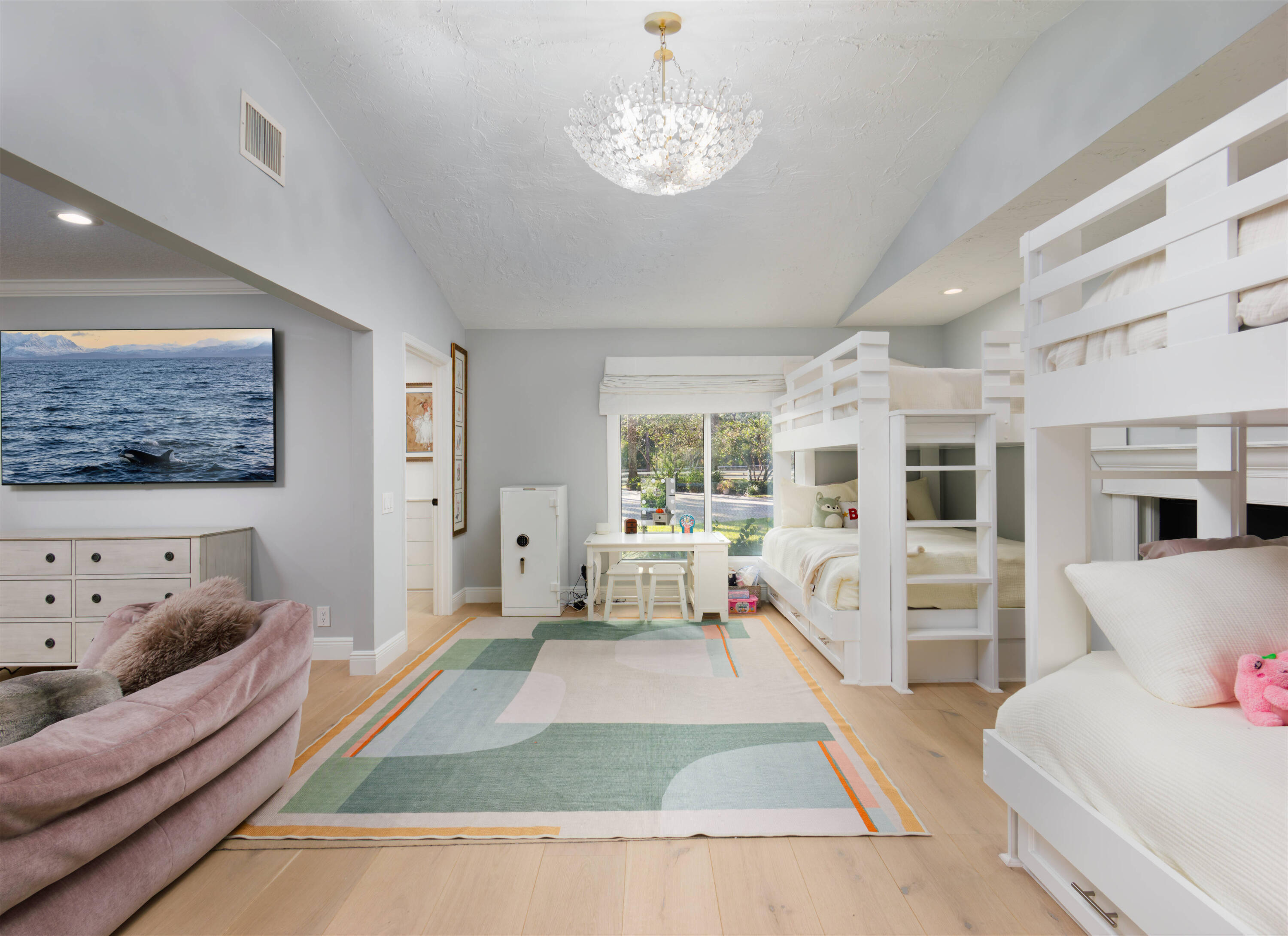 13395 Running Water Road Palm Beach Gardens, FL 33418 - Photo 36 of 112 a living room with furniture and a chandelier