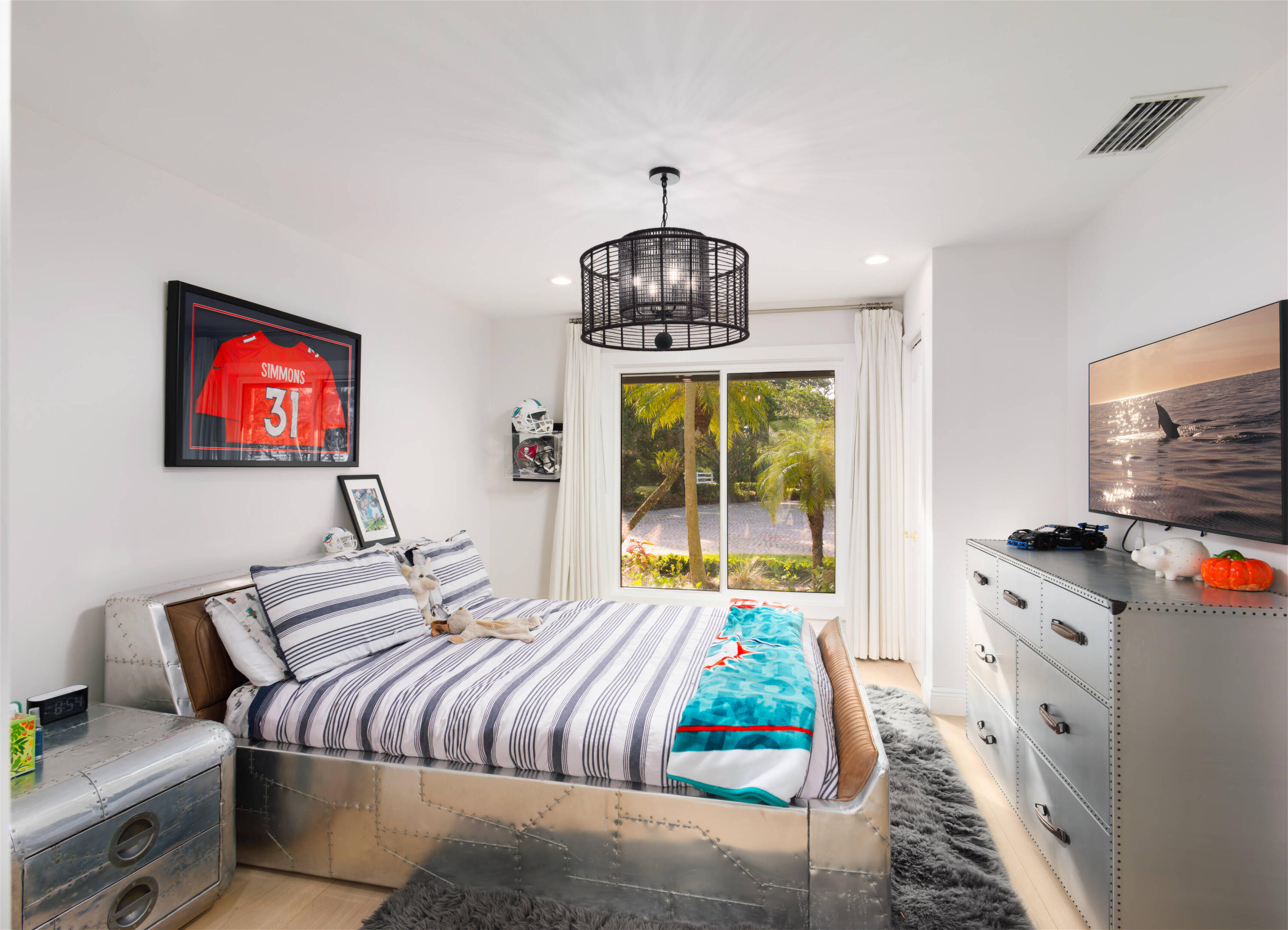 13395 Running Water Road Palm Beach Gardens, FL 33418 - Photo 56 of 112 a bedroom with a bed and a flat screen tv