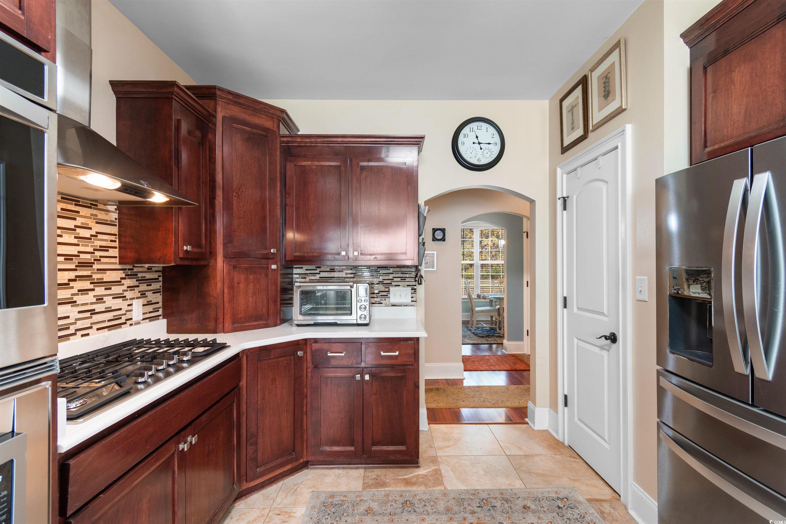 1815 Gilbert Road Conway, SC 29527 - Photo 17 of 40 Kitchen with wall chimney exhaust hood, stainless