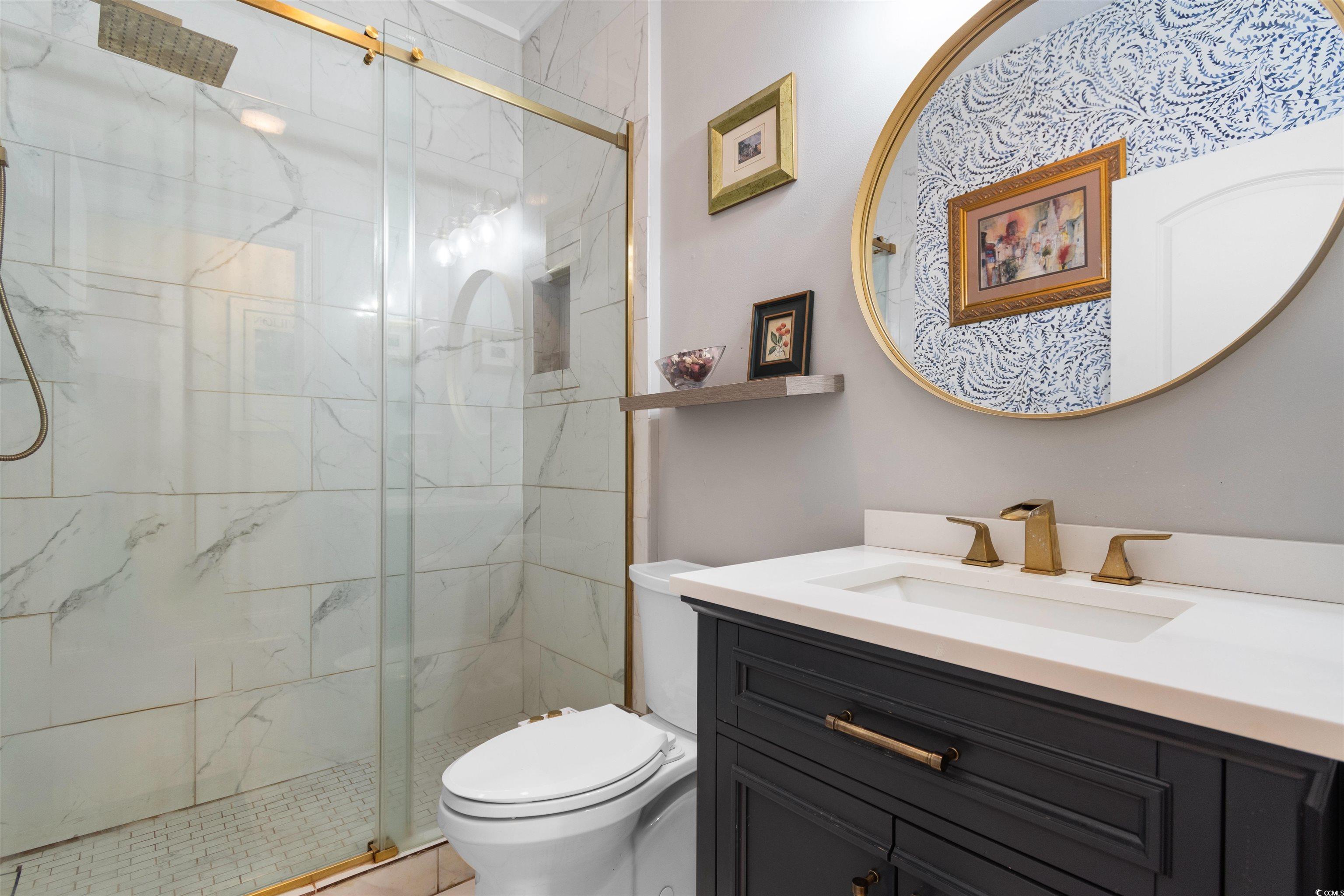 1815 Gilbert Road Conway, SC 29527 - Photo 25 of 40 Bathroom with toilet, vanity, and a shower with do