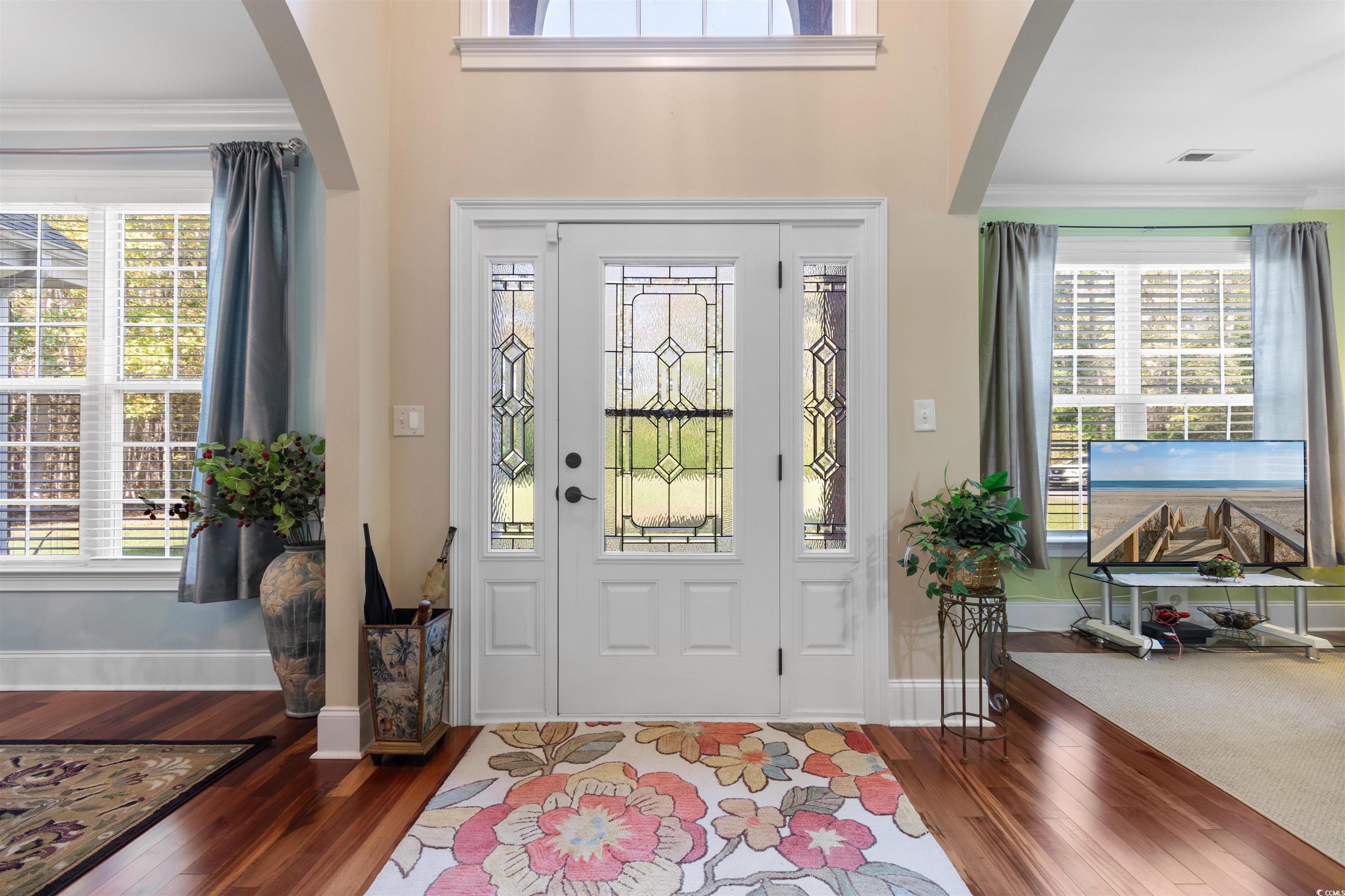 1815 Gilbert Road Conway, SC 29527 - Photo 3 of 40 Foyer with crown molding, a wealth of natural ligh