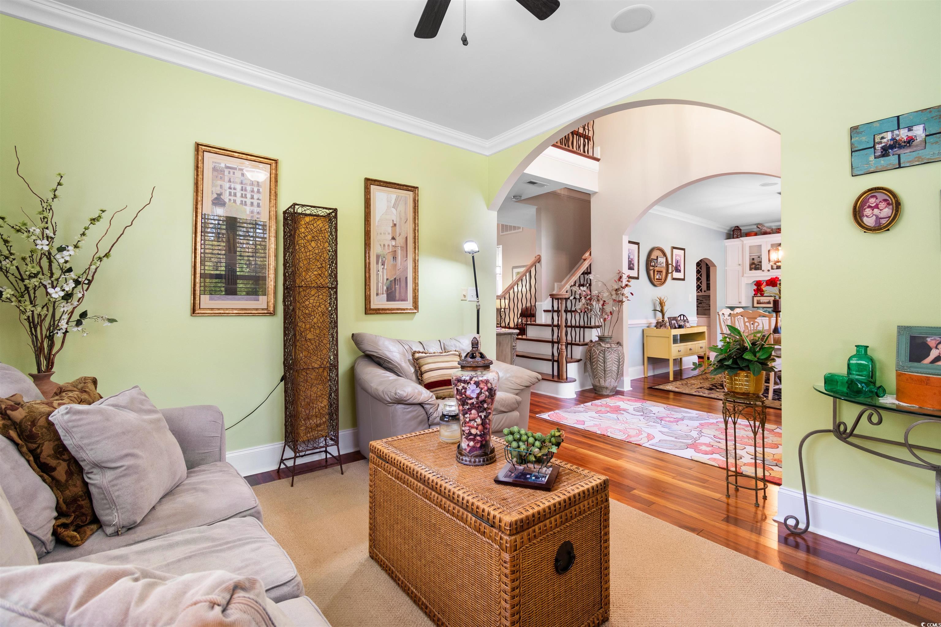 1815 Gilbert Road Conway, SC 29527 - Photo 5 of 40 Living room with ornamental molding, light wood-ty