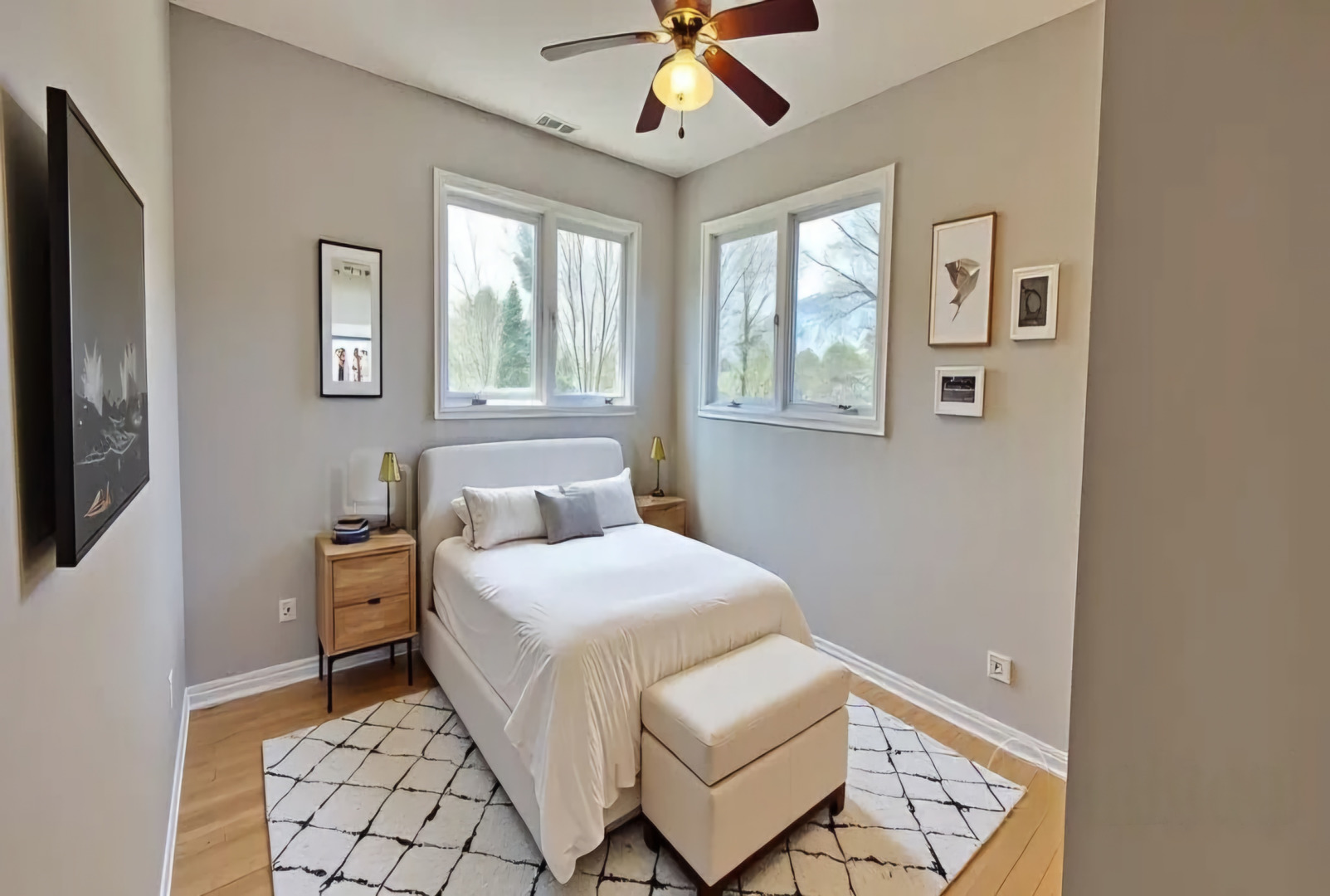 701 Oakton Street Park Ridge, IL 60068 - Photo 33 of 59 a bedroom with a bed and a chandelier