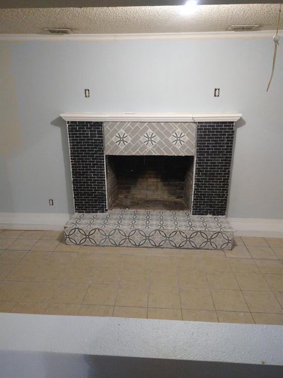 2817 Hickory Street Abilene, TX 79601 - Photo 7 of 11 a view of living room with a fireplace