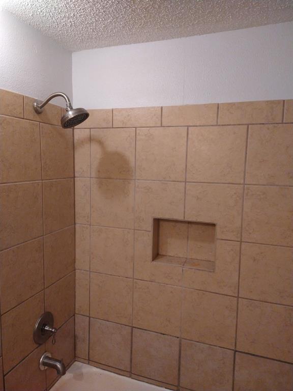 2817 Hickory Street Abilene, TX 79601 - Photo 8 of 11 a bathroom with a shower