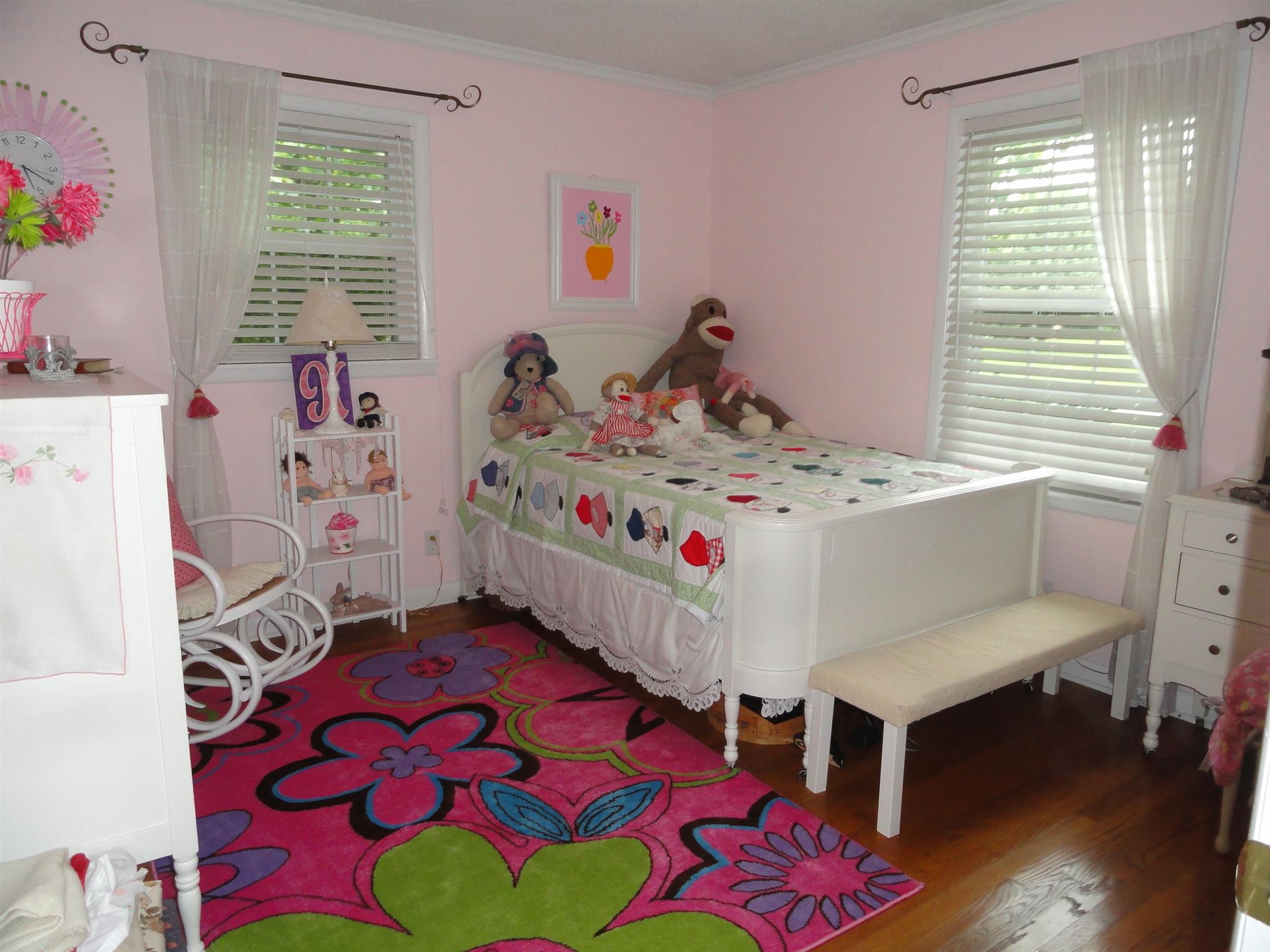 1711 Ann Road Lawrenceburg, TN 38464 - Photo 14 of 29 a bed room with a bed and a table in it