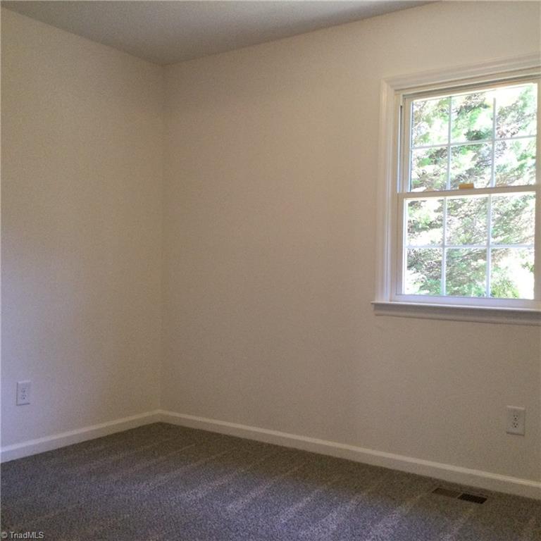 1017 Sales Street High Point, NC 27260 - Photo 29 of 40 Bedroom 3: Fearures include carpet flooring to help keep you warm on cool mornings, fresh new paint and a widnow for natural lighting.