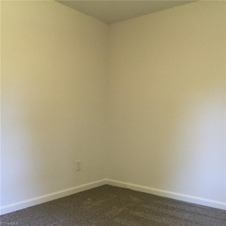 1017 Sales Street High Point, NC 27260 - Photo 31 of 40 Bedroom 3: Fearures include carpet flooring to help keep you warm on cool mornings, fresh new paint and a widnow for natural lighting.