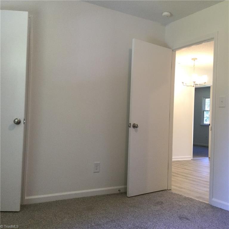 Bedroom 3: Fearures include carpet flooring to help keep you warm on cool mornings, fresh new paint and a widnow for natural lighting. The closet door is to the left side and the open door is the entry door.