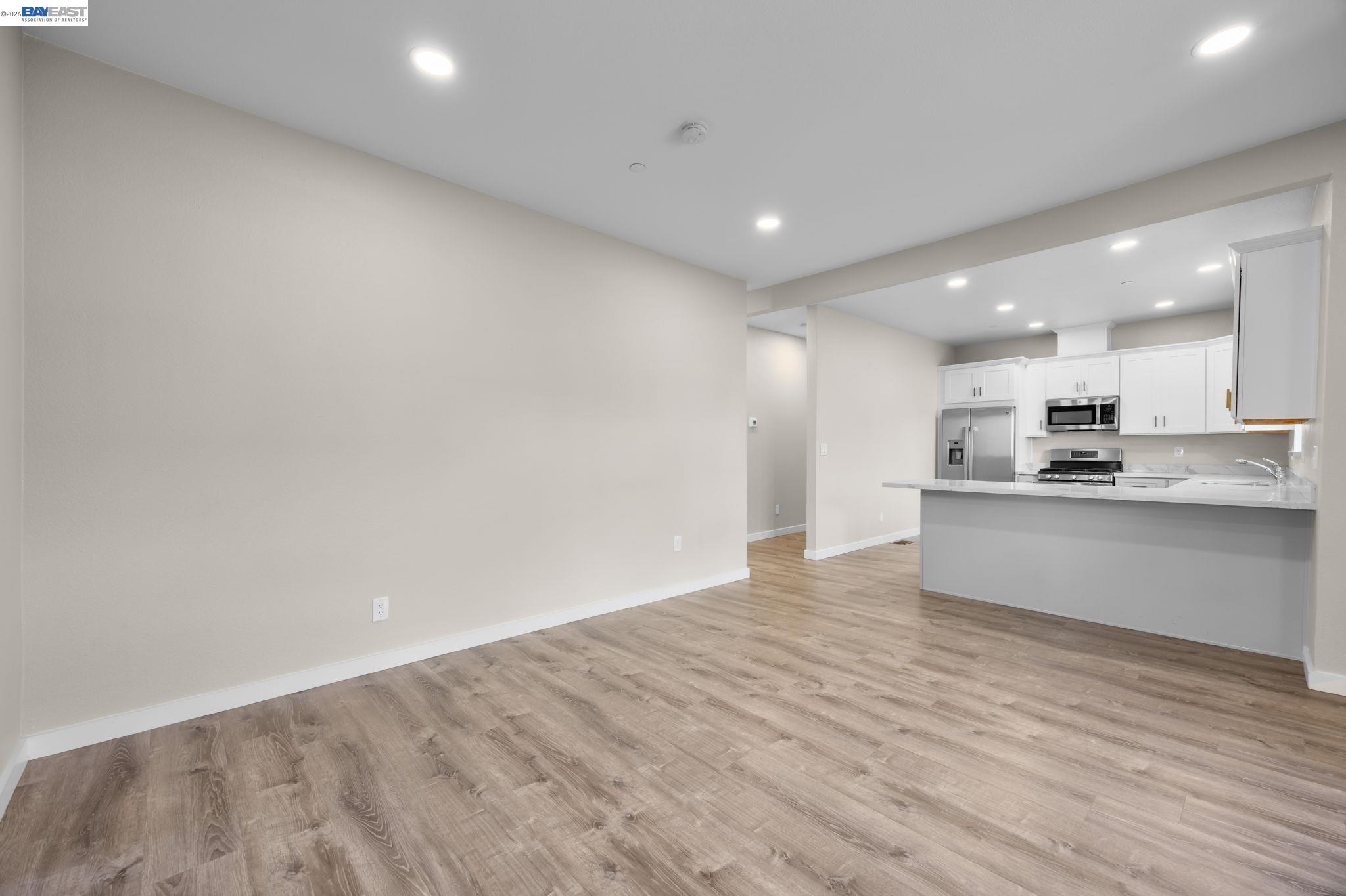 47 North 2nd Street Rio Vista, CA 94571 - Photo 13 of 42 a view of kitchen with kitchen island wooden floor center island and stainless steel appliances