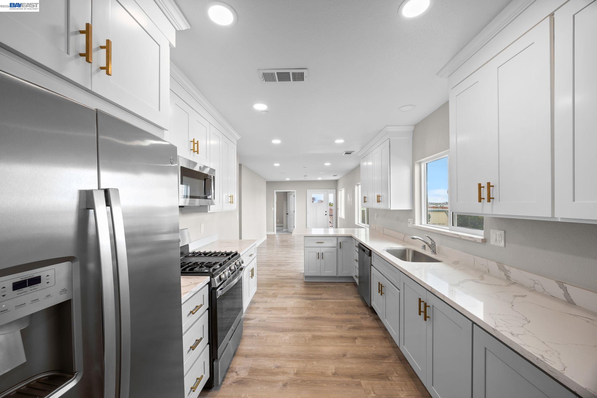 47 North 2nd Street Rio Vista, CA 94571 - Photo 23 of 42 a large kitchen with stainless steel appliances lots of counter top space