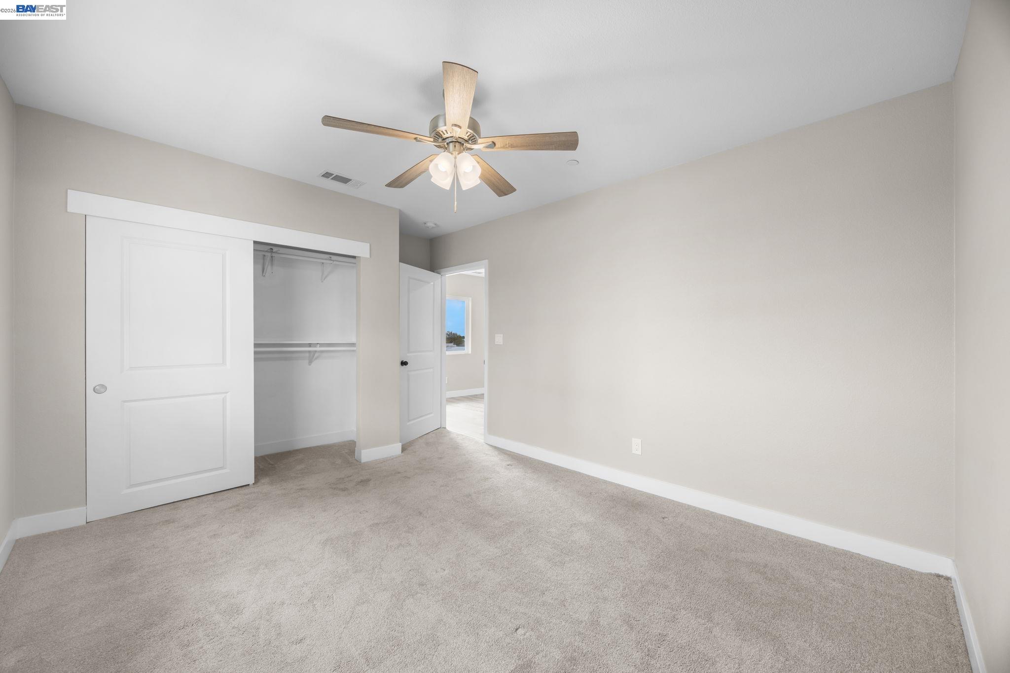 47 North 2nd Street Rio Vista, CA 94571 - Photo 29 of 42 an empty room with closet and windows