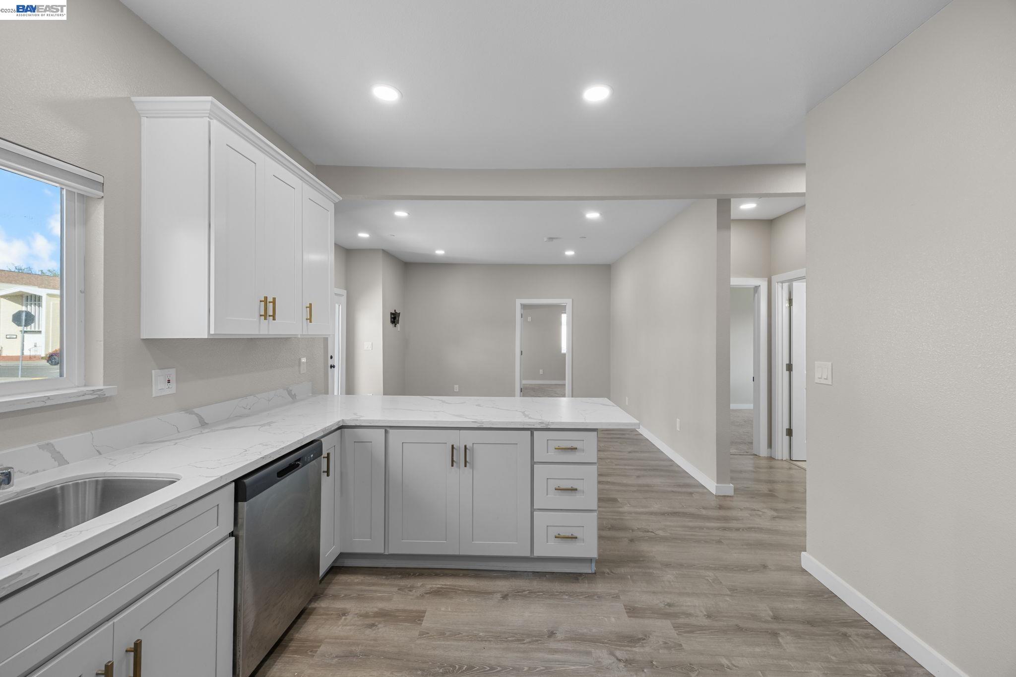 47 North 2nd Street Rio Vista, CA 94571 - Photo 10 of 42 a kitchen with a sink cabinets and window