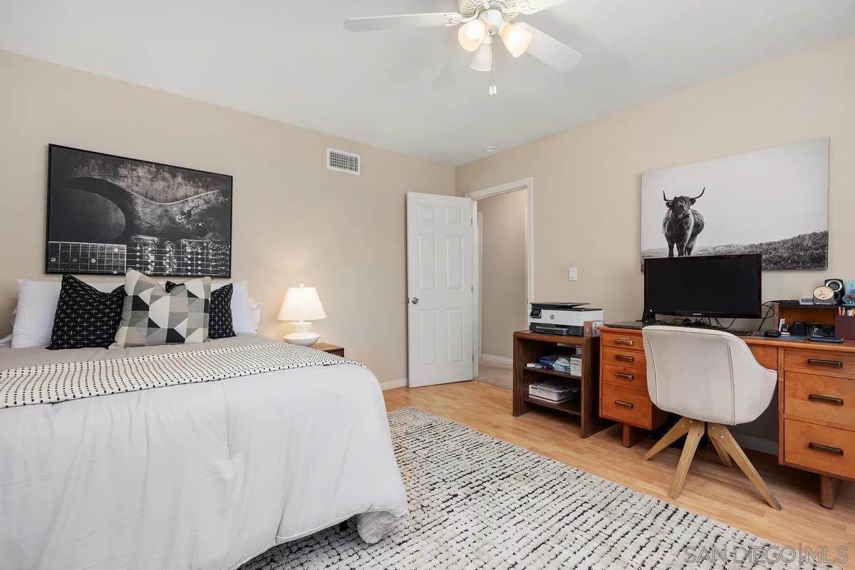 13961 Eastern Street Poway, CA 92064 - Photo 17 of 29 a bedroom with bed and a couch