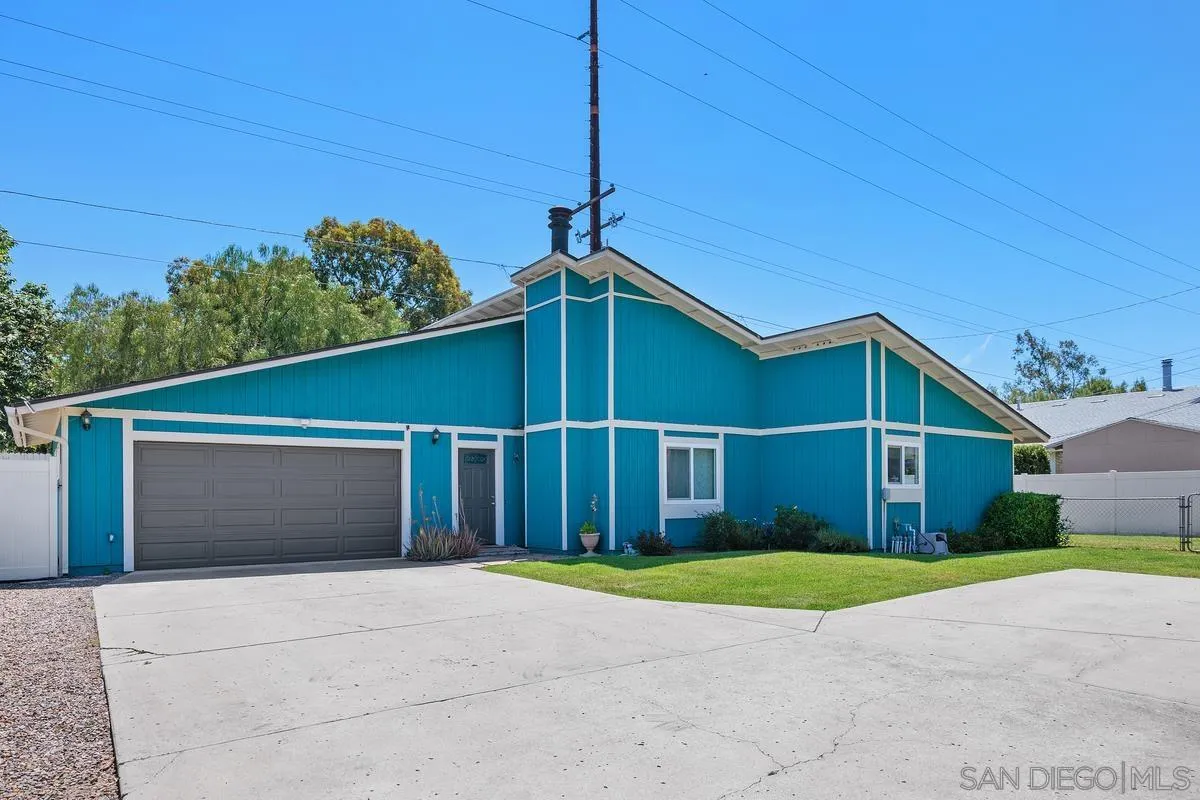 13961 Eastern Street Poway, CA 92064 - Photo 27 of 29 a view of a house with a yard and potted plants
