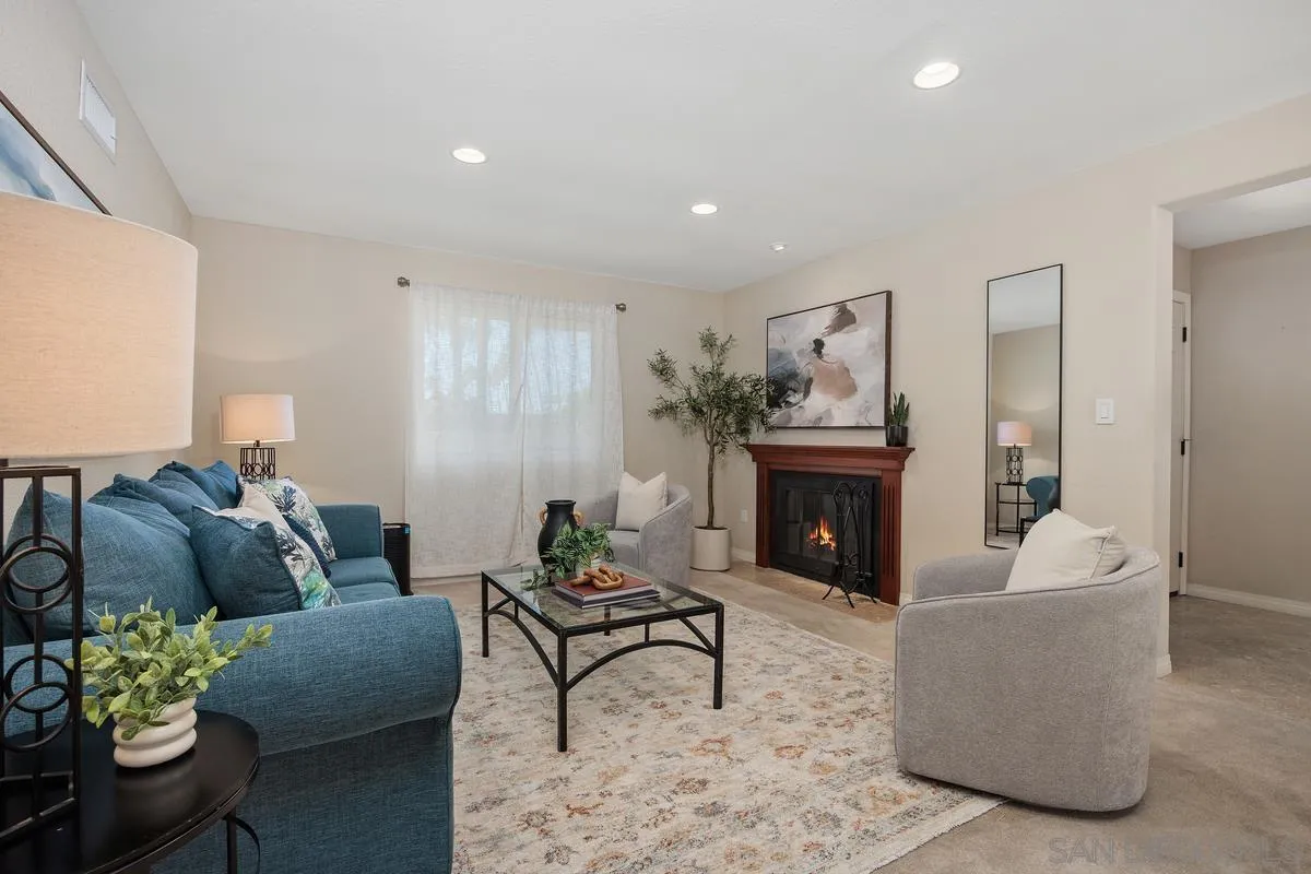 13961 Eastern Street Poway, CA 92064 - Photo 4 of 29 a living room with furniture and a fireplace