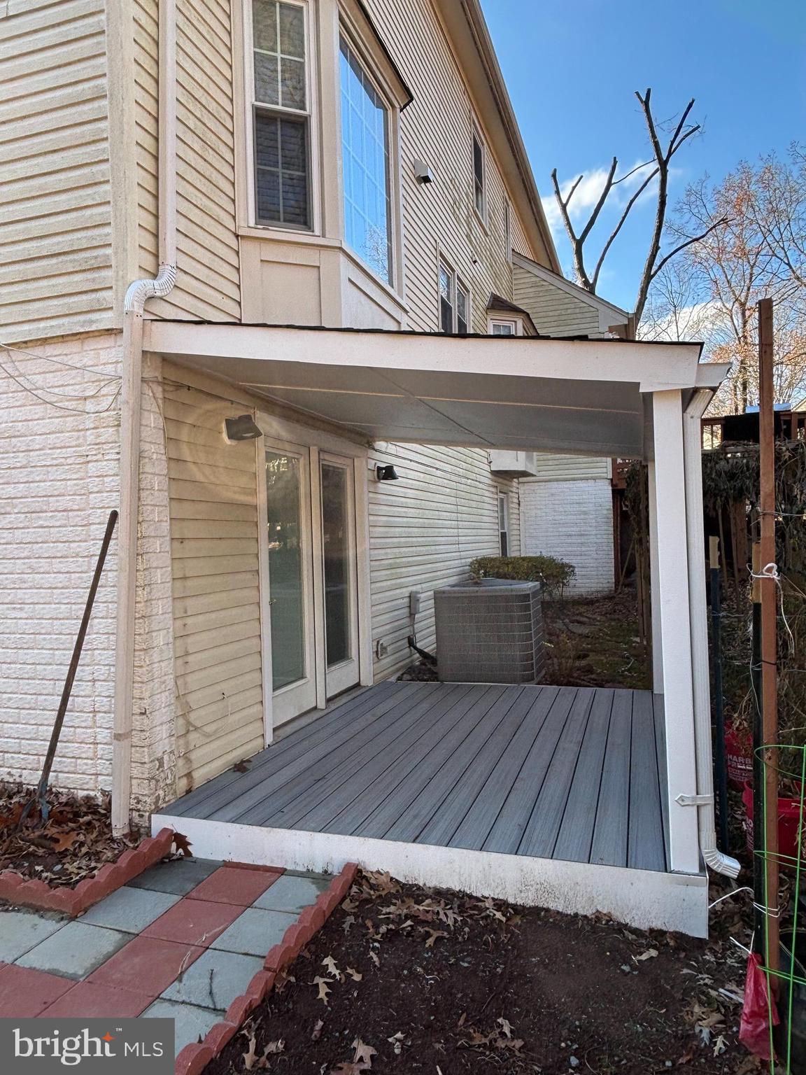 44140 Bristow Circle Ashburn, VA 20147 - Photo 13 of 14 a view of backyard with a wooden deck
