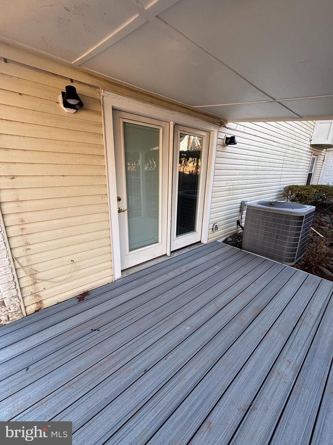 44140 Bristow Circle Ashburn, VA 20147 - Photo 14 of 14 a view of a deck with wooden floor and seating space