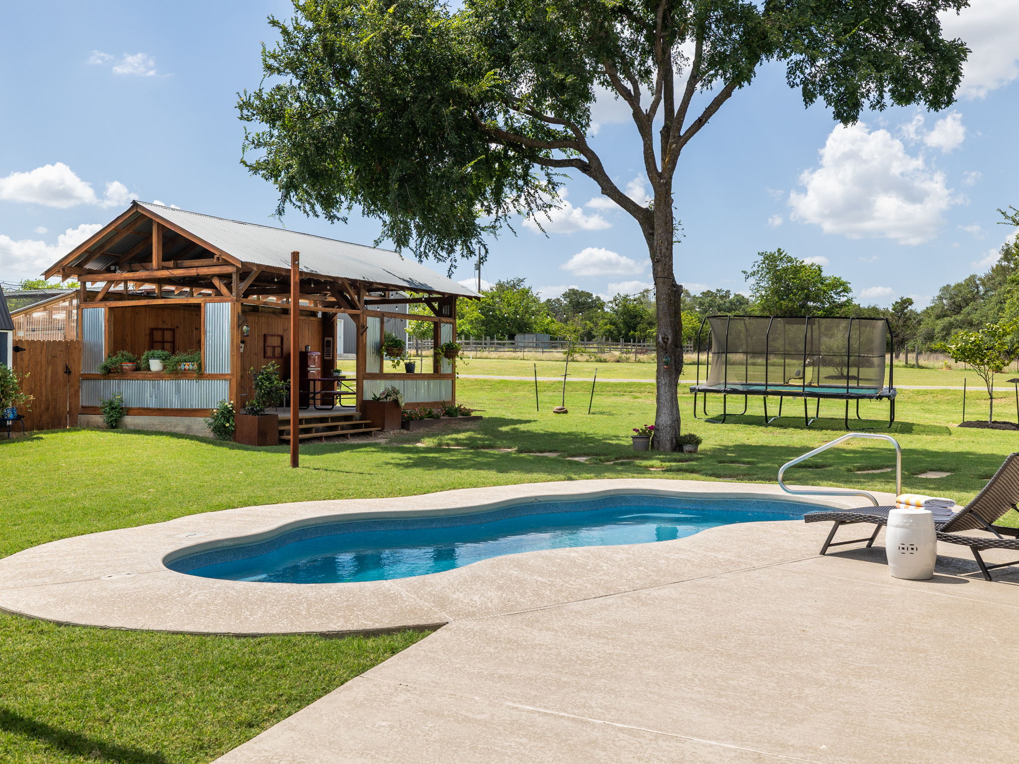 3001 County Road 255 Georgetown, TX 78633 - Photo 4 of 35 The charming covered patio structure is also a great space for a band and dancing.