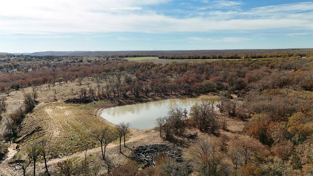 0 Marley Road Jacksboro, TX 76458 - Photo 25 of 32 Bird's eye view of a nearby body of water and a heavily wooded area