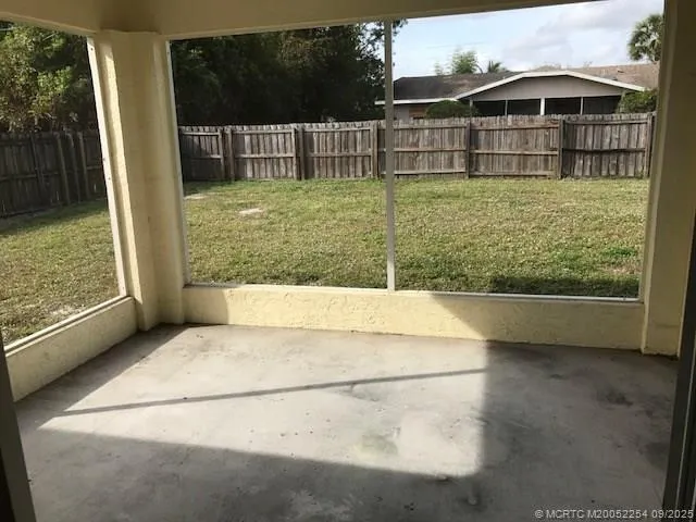 an empty room with window